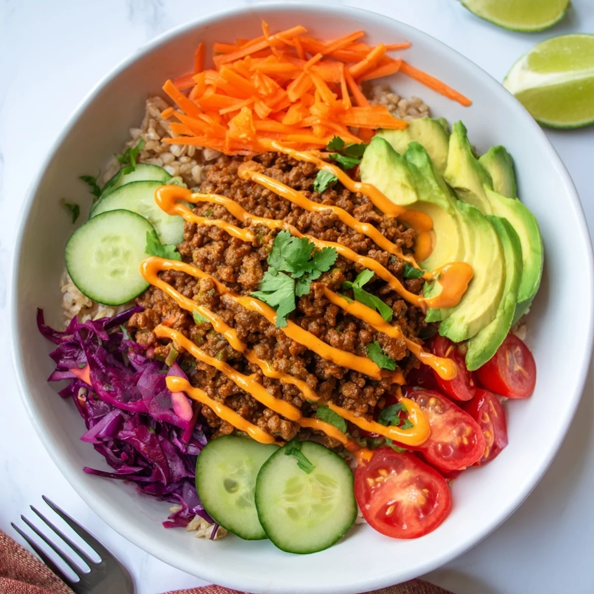 Wholesome plant-based meat bowl featuring tender avocado and crunchy red cabbage.  