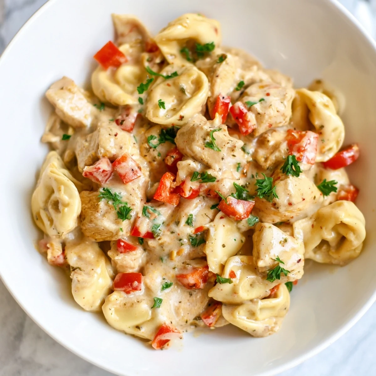 Savory Zesty Cajun Garlic Parmesan Chicken Tortellini served warm, perfect for a weeknight dinner.