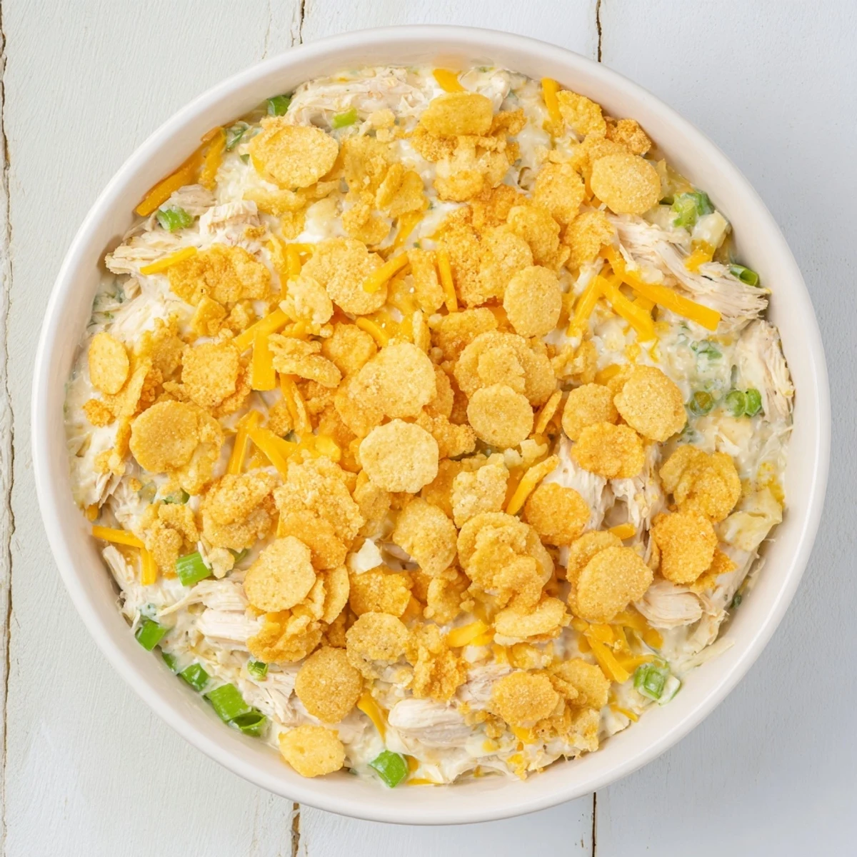 A creamy, cheesy Neiman Marcus-Style Chicken Casserole showcases tender chicken and a crunchy, delicious crust.