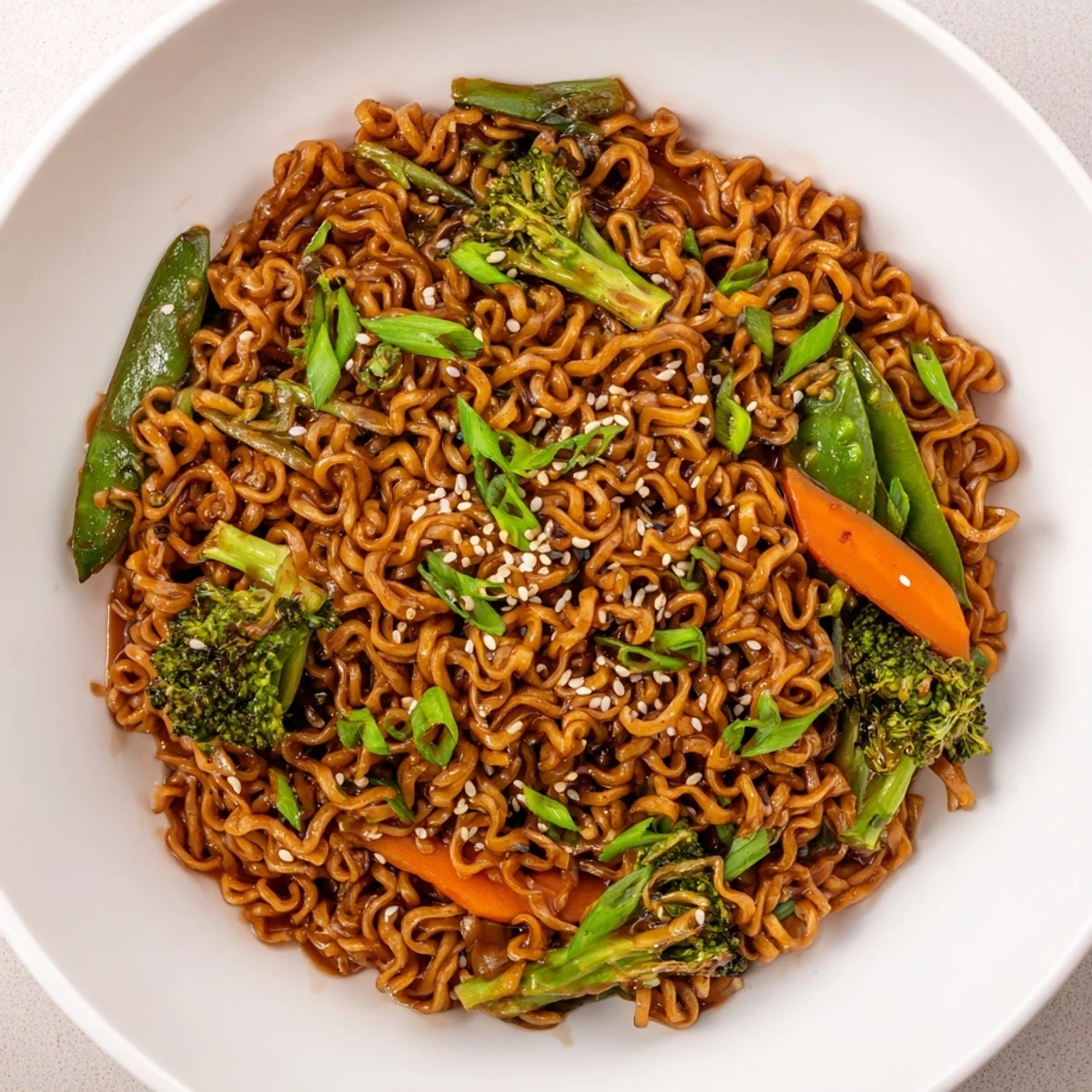 Steaming hot Ramen Noodle Stir-Fry Remix, loaded with colorful vegetables and savory sauce.