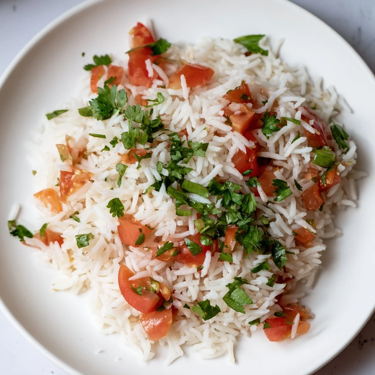 This hearty Tomato-Rice Skillet Dinner features tender rice simmered in a rich tomato sauce.
