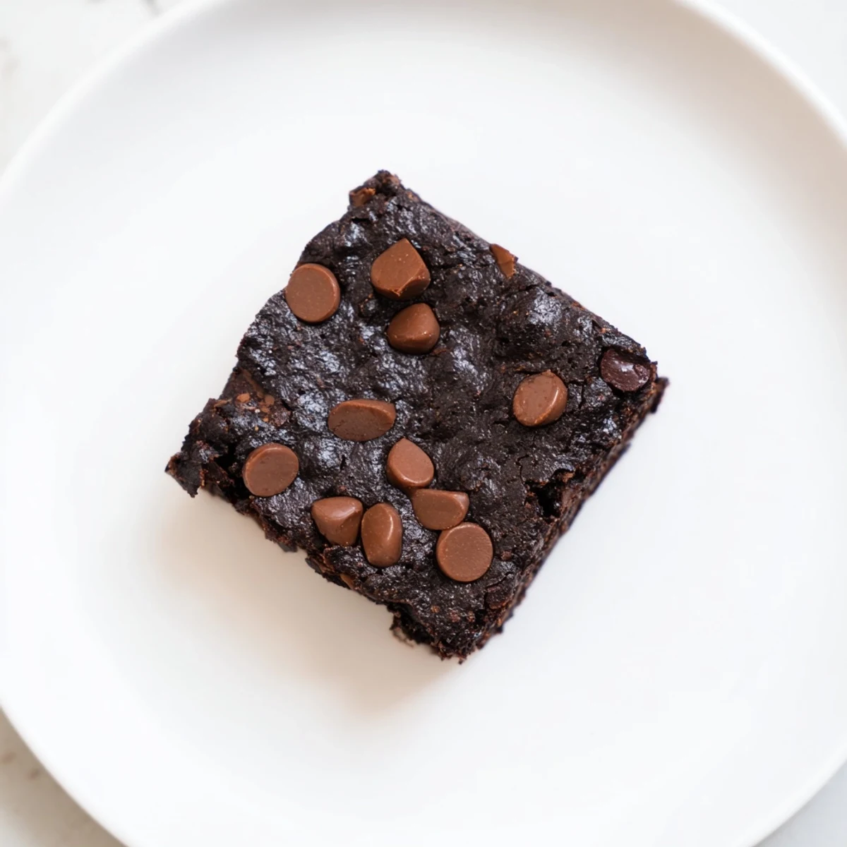 A close-up of delicious Black Bean Brownies; a moist, healthy dessert, ideal after dinner.