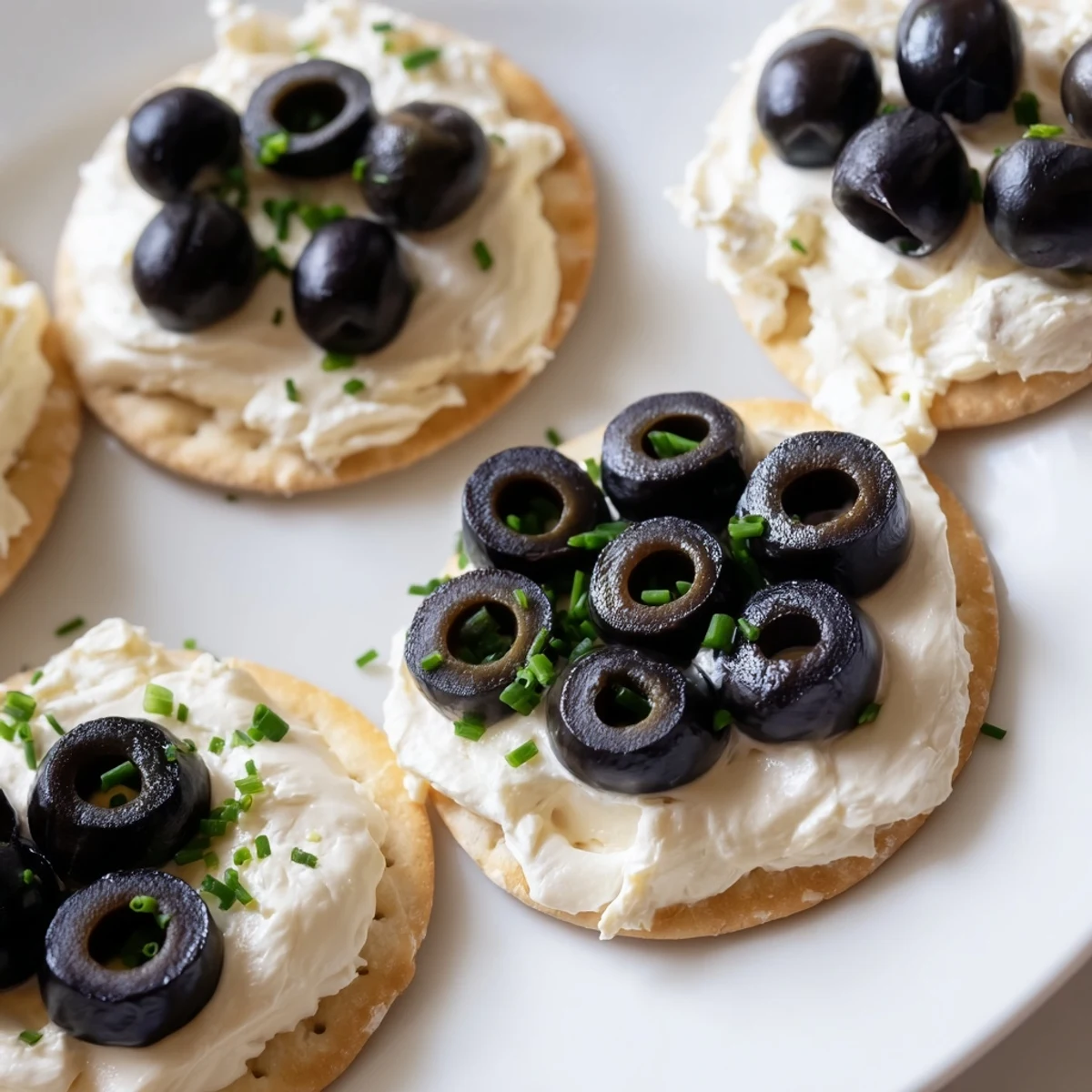 Gold Medal Olympic Ring Appetizers: Five colorful, creamy ring appetizers artfully arranged on a platter ready to serve.