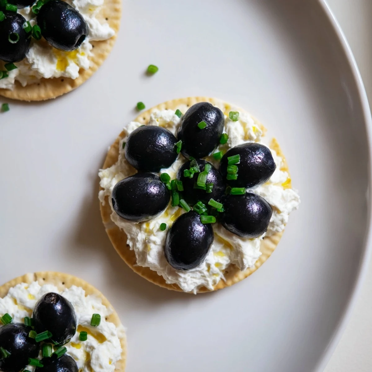 Image reveals fresh Gold Medal Olympic Ring Appetizers, featuring a creamy base & vibrant toppings, ready to enjoy.