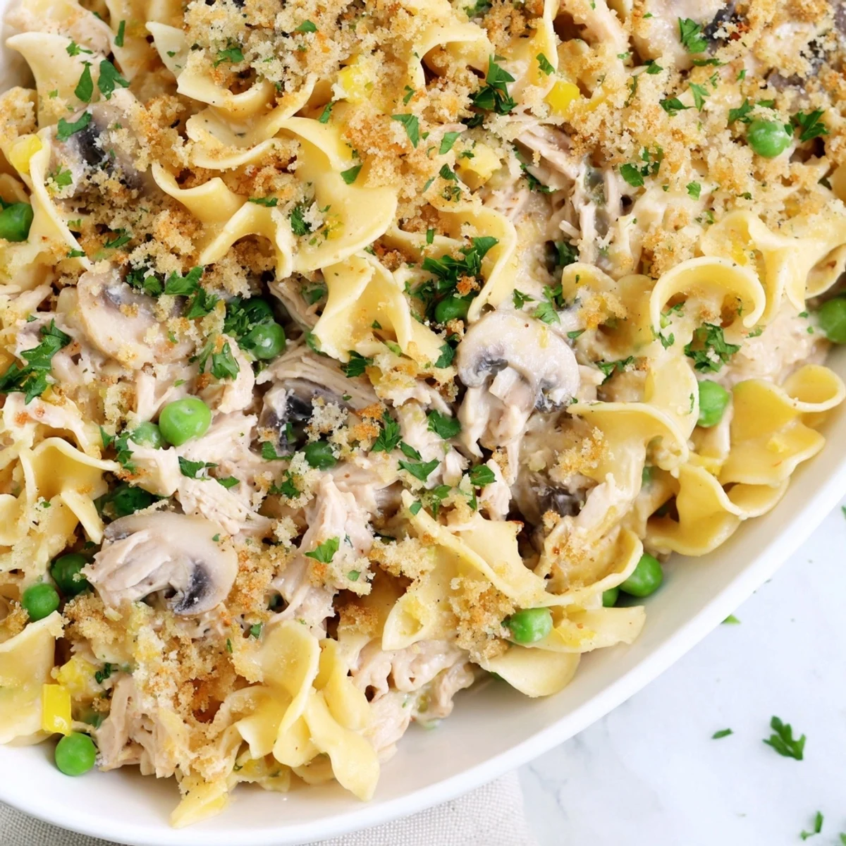 Creamy Tuna Noodle Casserole 2.0 with golden topping, ready to serve, a comforting classic.