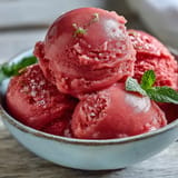 Deliciously simple Watermelon Sorbet (3 Ingredients) shown frozen and ready to scoop on a summer evening.