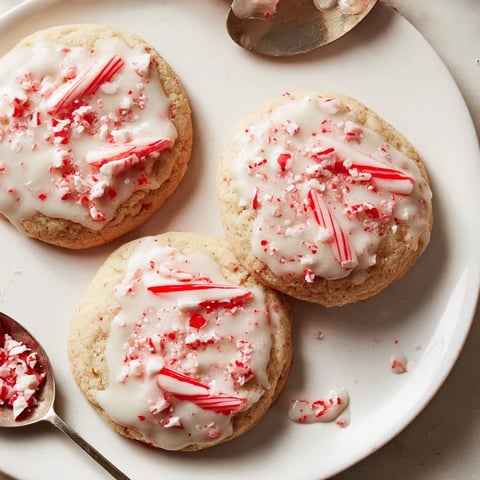 Soft, peppermint candy soda float cookies drizzled with fizzy, sweet glaze on top.  