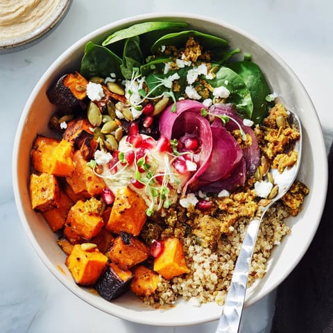 Cozy spiced winter bowls with roasted veggies, ube-coconut purée, and toppings.  