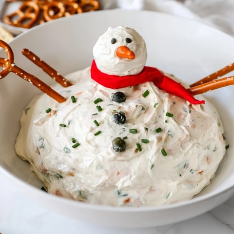 Melted Snowman Dip Bowl offers a creamy, cheesy dip with a fun, festive snowman presentation.