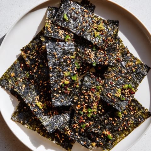 Golden-brown Snacks de Vague Surf, a crispy seaweed delight, ready to serve as a flavorful snack.