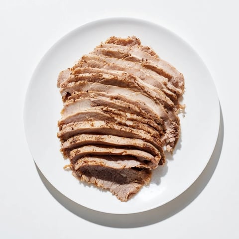 Sizzling slices of Turkish Döner Meat, perfectly spiced and ready to be enjoyed in warm flatbreads.