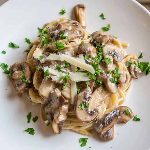 Scrumptious Creamy Mushroom Linguine, pasta beautifully coated in a rich, velvety mushroom sauce, ready to enjoy.