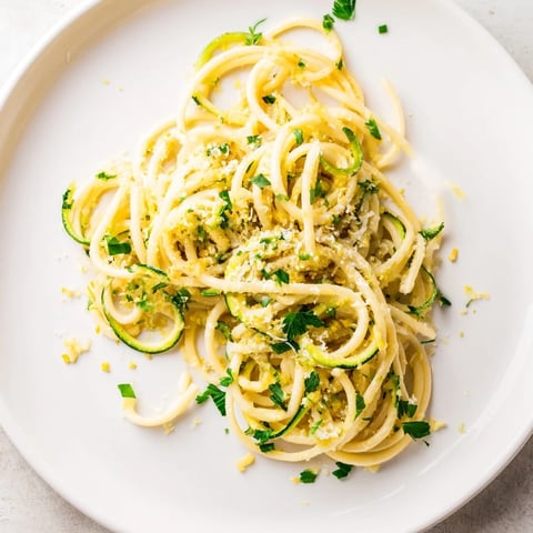 Vibrant Lemon Zucchini Pasta dish, with tender zucchini and bright lemon sauce coating each strand.