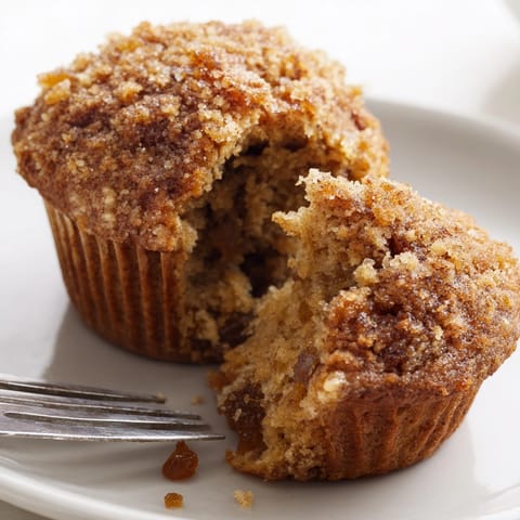 Homemade Cinnamon Ginger Spice Muffins, studded with crystallized ginger, ready to serve.