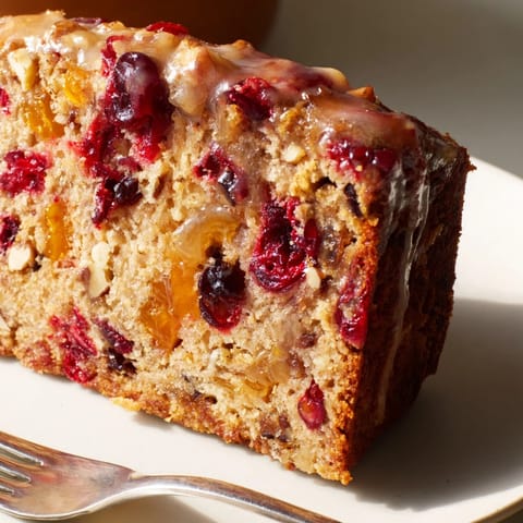 Warm spices fill the air from fresh-baked Ginger Cranberry Dutch Holiday Snack Loaf.