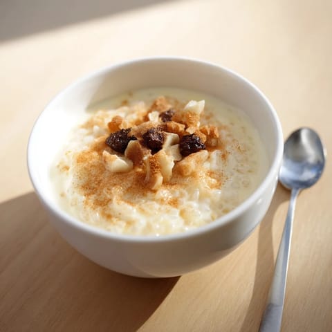 Delightful Japanese rice pudding garnished with velvety chestnut cream and candied nuts.  