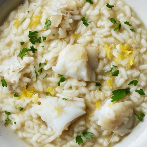 A comforting bowl of Smoked Haddock Risotto with silky Arborio rice and a hint of lemon zest.  