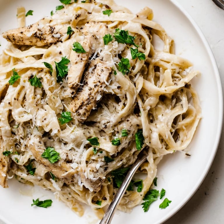 Succulent turkey strips tossed in Cajun Spiced Turkey Alfredo, served steaming hot.  