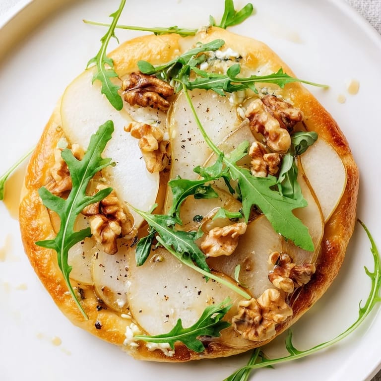 On a rustic wooden board, a stack of these savory vegetarian Italian appetizers glistens with honey drizzle.